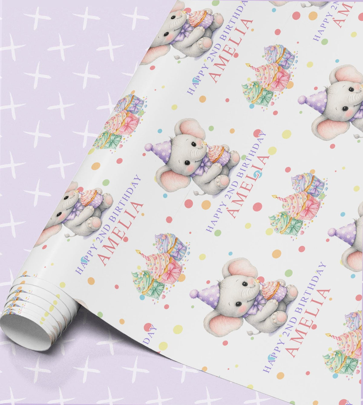 Personalised birthday wrapping paper roll with a grey elephant in a party hat, rainbow cupcakes, confetti dots and the name Amelia with Happy 2nd Birthday