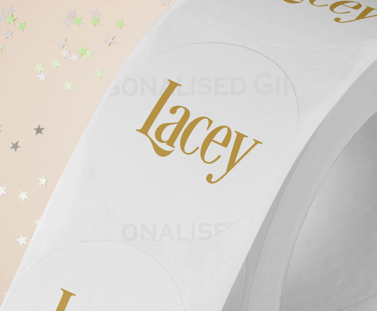 Personalised colourful festive name stickers on a strip of three, glossy gift labels