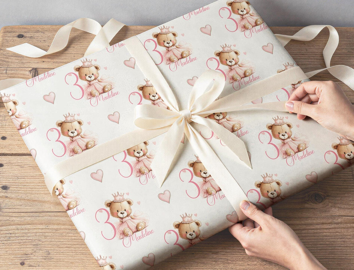 Personalised pink princess teddy bear wrapping paper with custom name and age, birthday gift wrap for girls.