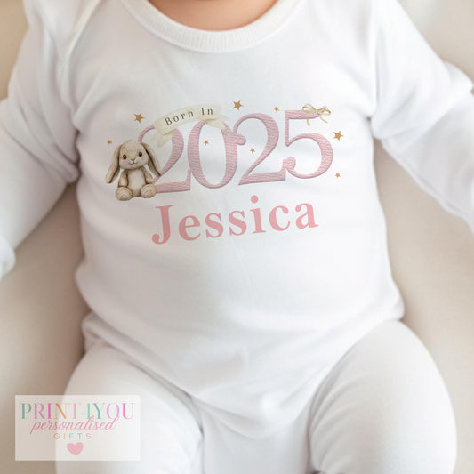 Personalised pink bunny 'Born In 2025' baby bib with custom name printed on soft cotton, popper fastening.