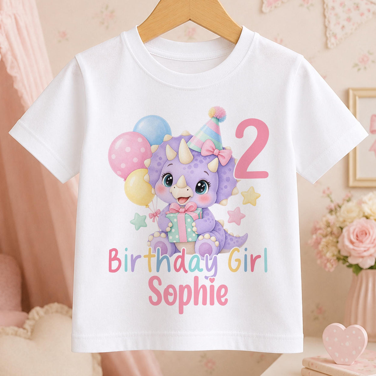 Personalised dinosaur birthday t-shirt – white tee with a lilac dinosaur in a party hat with balloons, pink number 2, Birthday Girl and the name Sophie