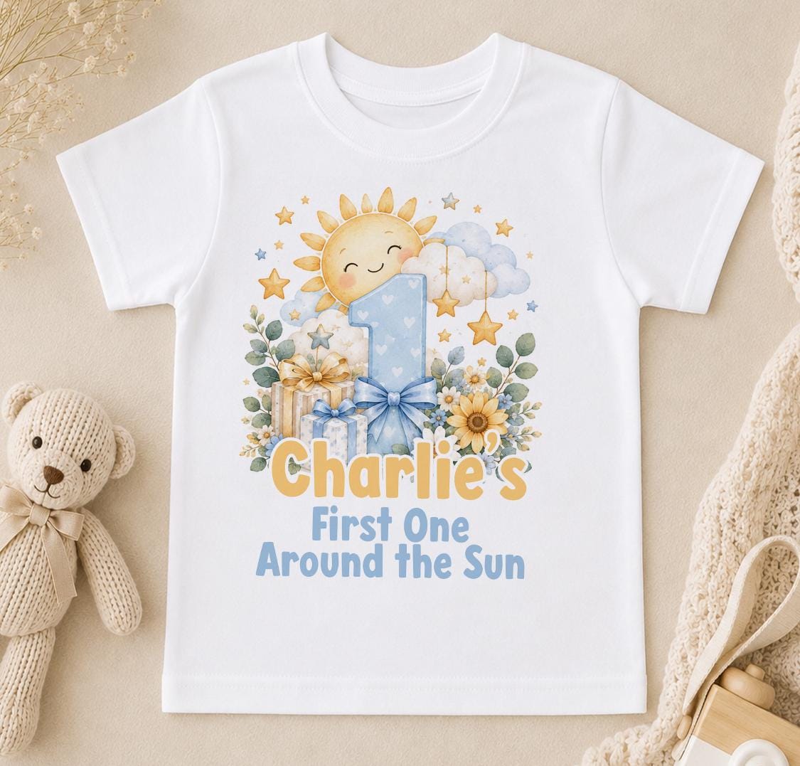 Personalised First One Around the Sun first birthday t-shirt – smiling sun, blue number 1 and the name Charlie