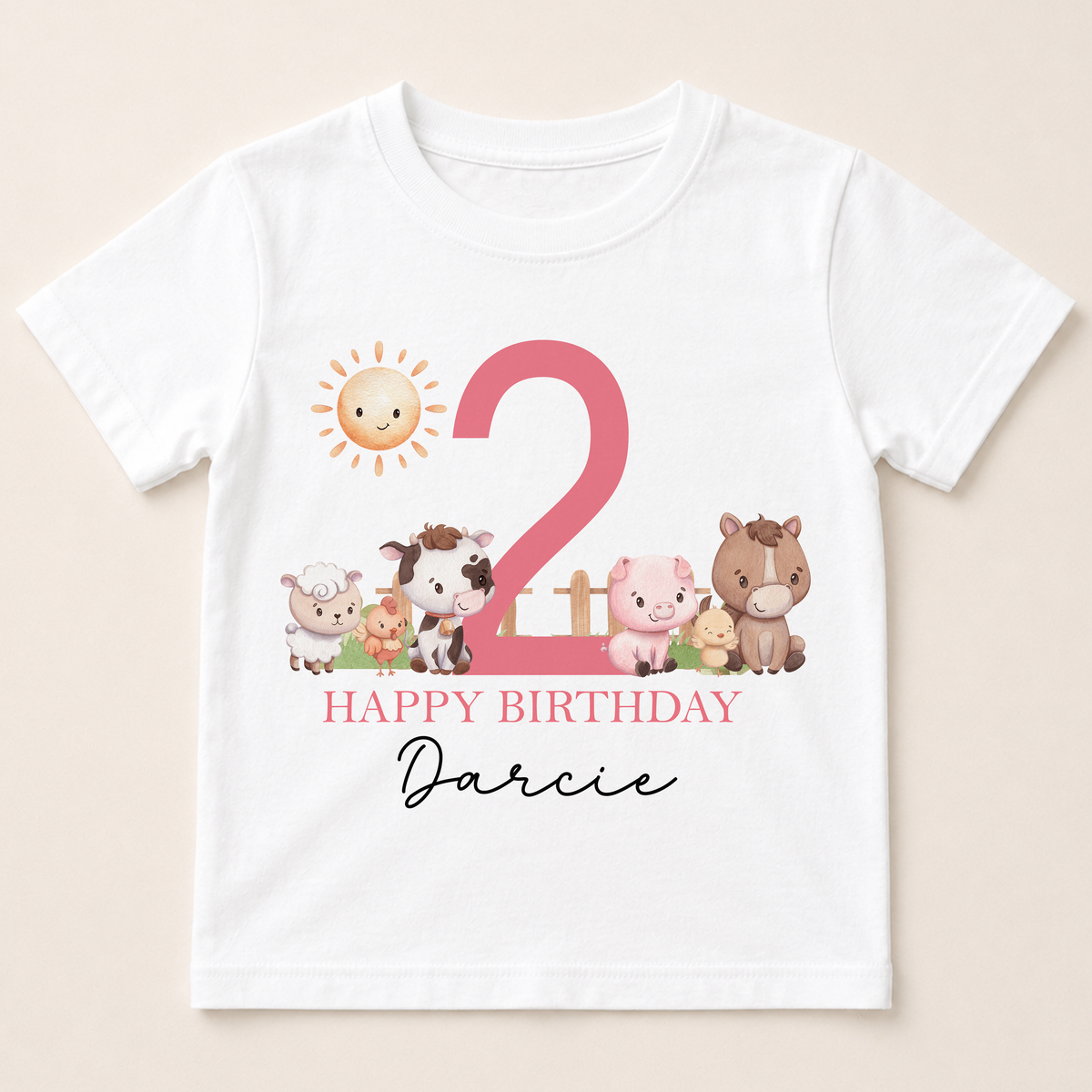 White children's t-shirt printed with farm animals, a pink birthday number and the personalised name Darcie.