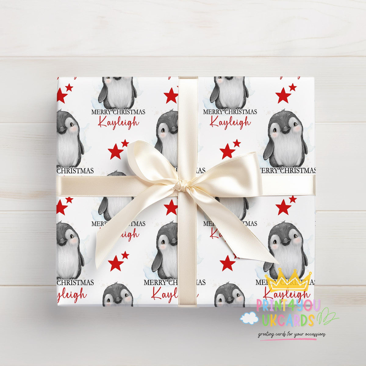 Printed christmas wrapping paper shown as wrapping paper