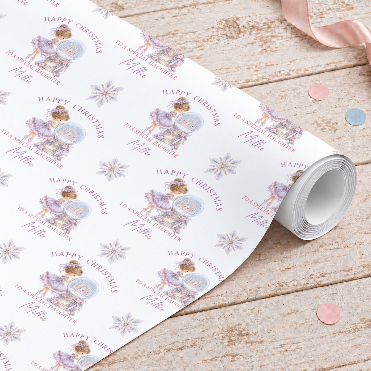 Roll of personalised Christmas wrapping paper with a ballerina by a pastel Christmas tree, Happy Christmas To A Special Daughter and the name Elsie