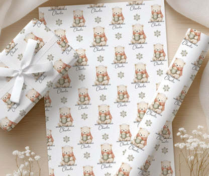 Personalised polar bear wrapping paper shown wrapped around a Christmas present