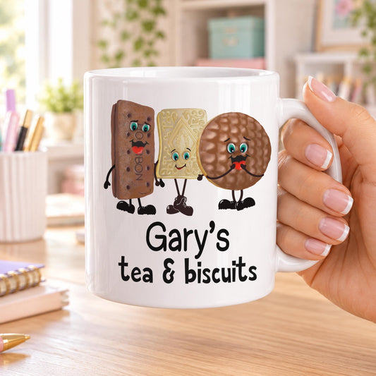 Personalised white tea and biscuits mug printed with smiling bourbon, custard cream and chocolate digestive characters above a name with tea & biscuits