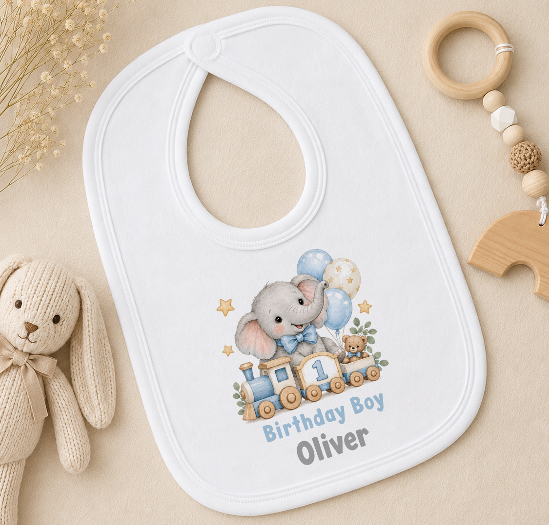 Personalised elephant train first birthday bib with Birthday Boy Oliver