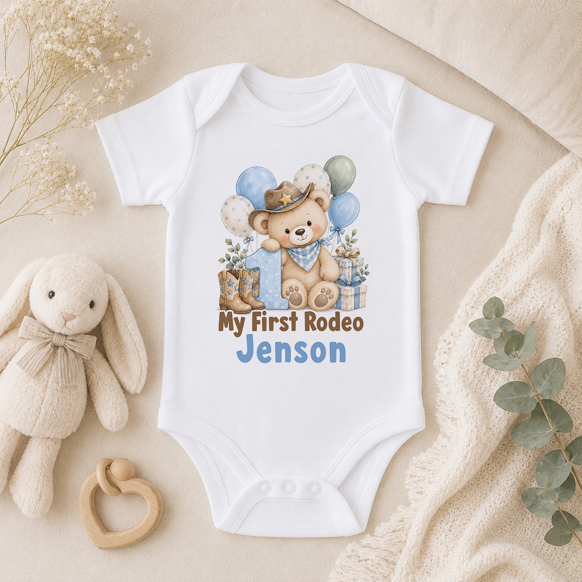 Personalised My First Rodeo first birthday baby vest with the name Jenson