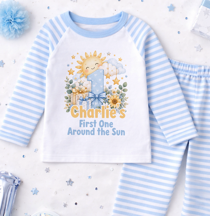 Personalised 1st birthday pyjamas, Sunshine First One Around the Sun design with name, blue and white striped