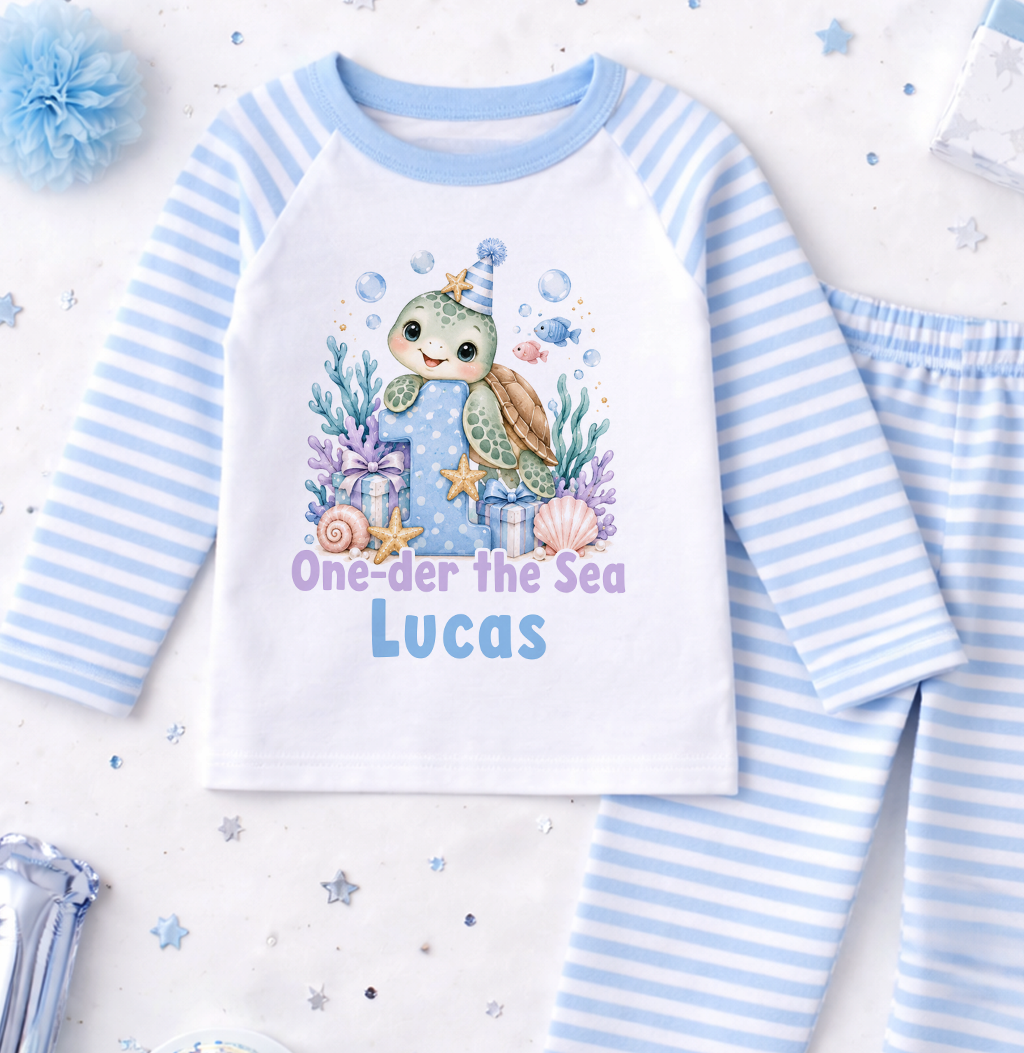 Personalised 1st birthday pyjamas, Turtle One-der the Sea design with name, blue and white striped