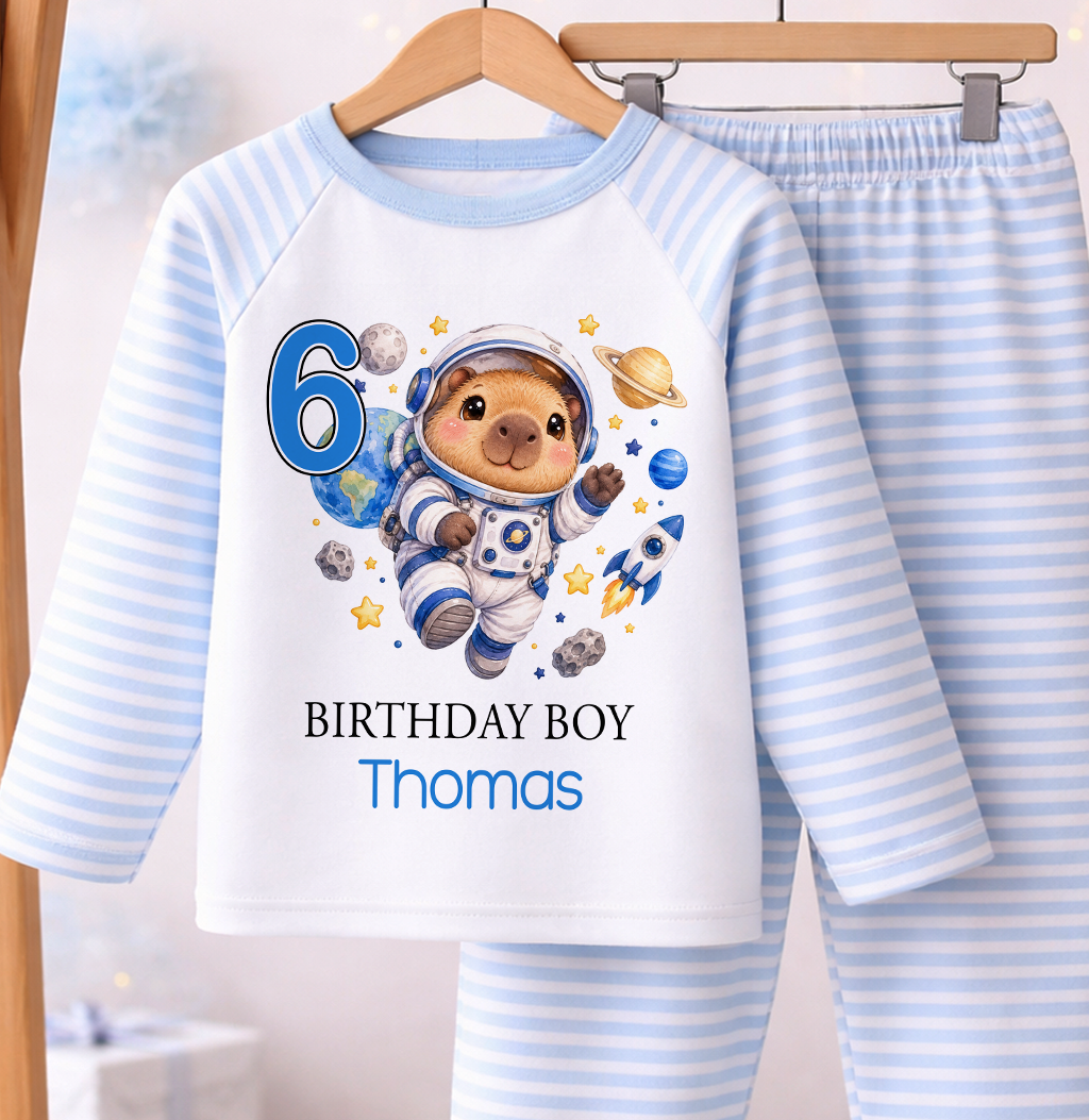 Personalised birthday boy pyjamas, Capybara Astronaut design with name and age, blue and white stripe