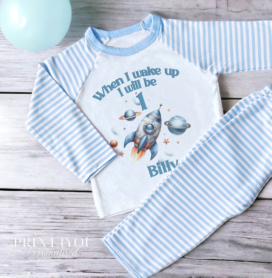 Personalised blue and white striped pyjamas with space rocket design, size 6-12 months