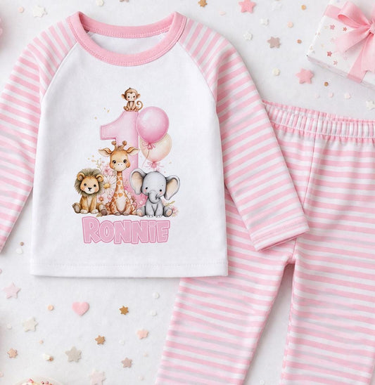 Personalised pink safari animals 1st birthday pyjama set with the child's name printed on soft cotton