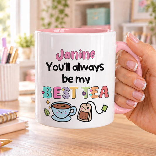 Personalised best friend mug with pink handle and inside, printed with a name and You’ll always be my Best Tea in colourful letters with a smiling teacup and teabag