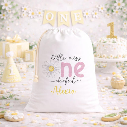 Personalised 'One-derful' birthday sack laid flat, showing the daisy design and printed name
