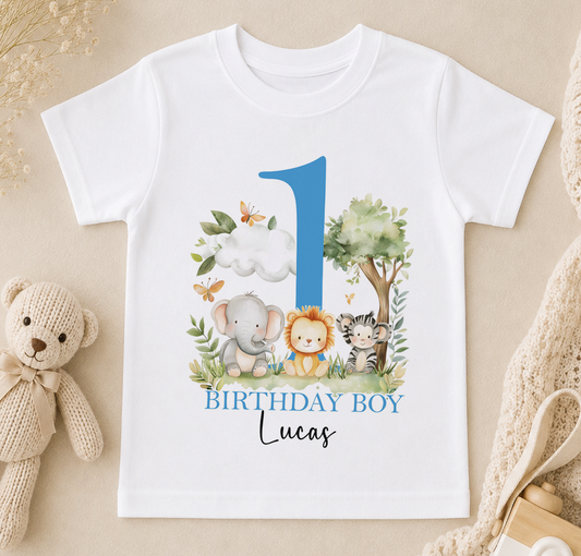 Personalised t-shirt printed with a blue number one and safari animals including an elephant, lion and tiger, with 'Birthday Boy Lucas' lettering