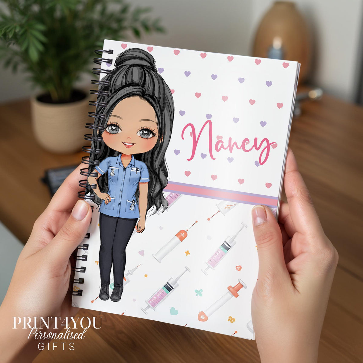 Personalised A5 nurse notebook with spiral binding, printed with a custom name and Nurse 3 character design