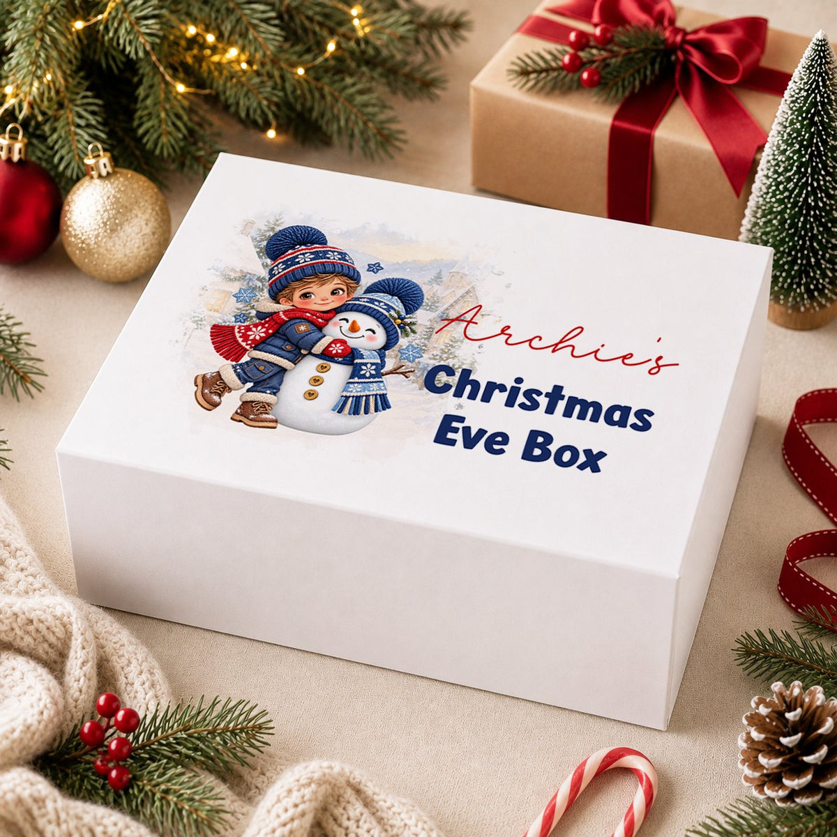 Personalised Christmas Eve box, white magnetic gift box printed with a girl in pink knitted pyjamas hugging a white bunny by a snowy window and the name Lottie