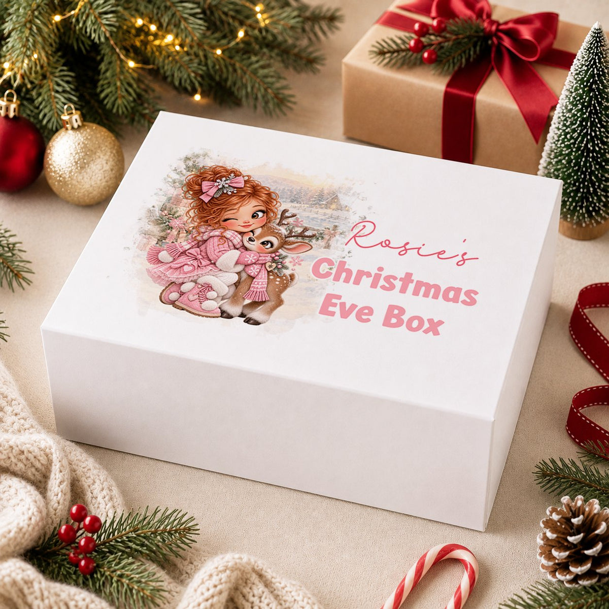 Personalised Christmas Eve box, white magnetic gift box printed with a snowman in a blue bobble hat with a bunny and hedgehog in a snowy woodland and the name Jaxon