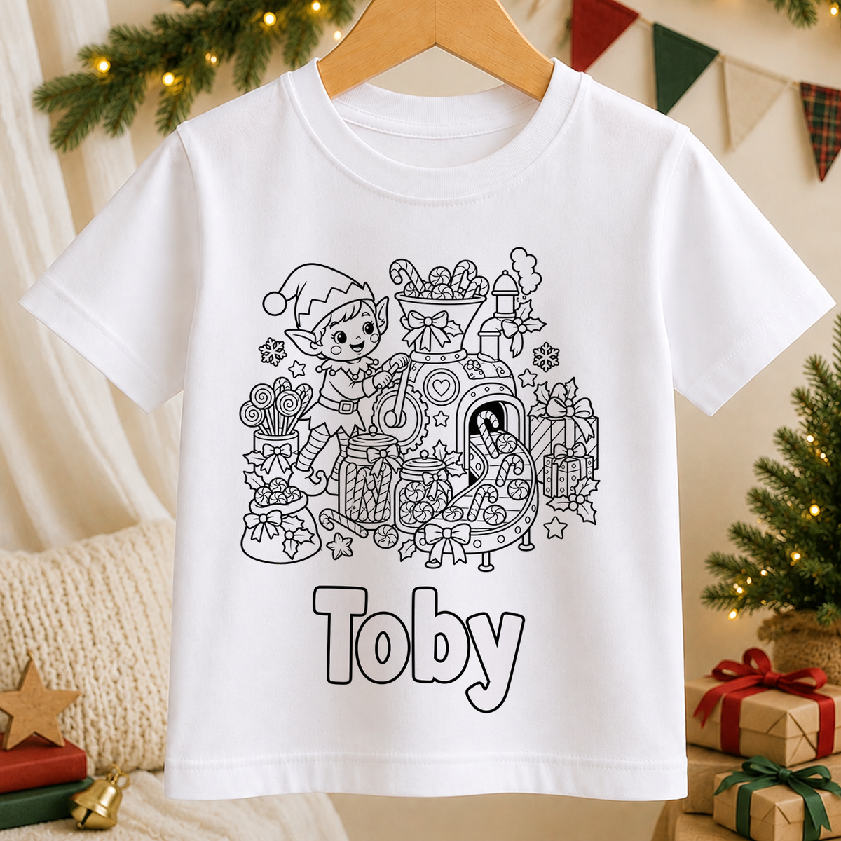 Personalised Christmas colour-in kids t-shirt with a black and white Elf Sweet Factory line art design and a name in bubble letters to colour in