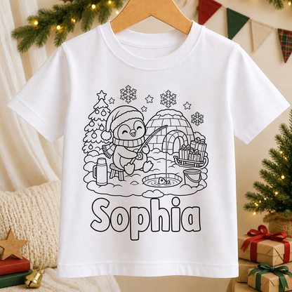 Personalised Christmas colour-in kids t-shirt with a black and white Penguin Ice Fishing line art design and a name in bubble letters to colour in