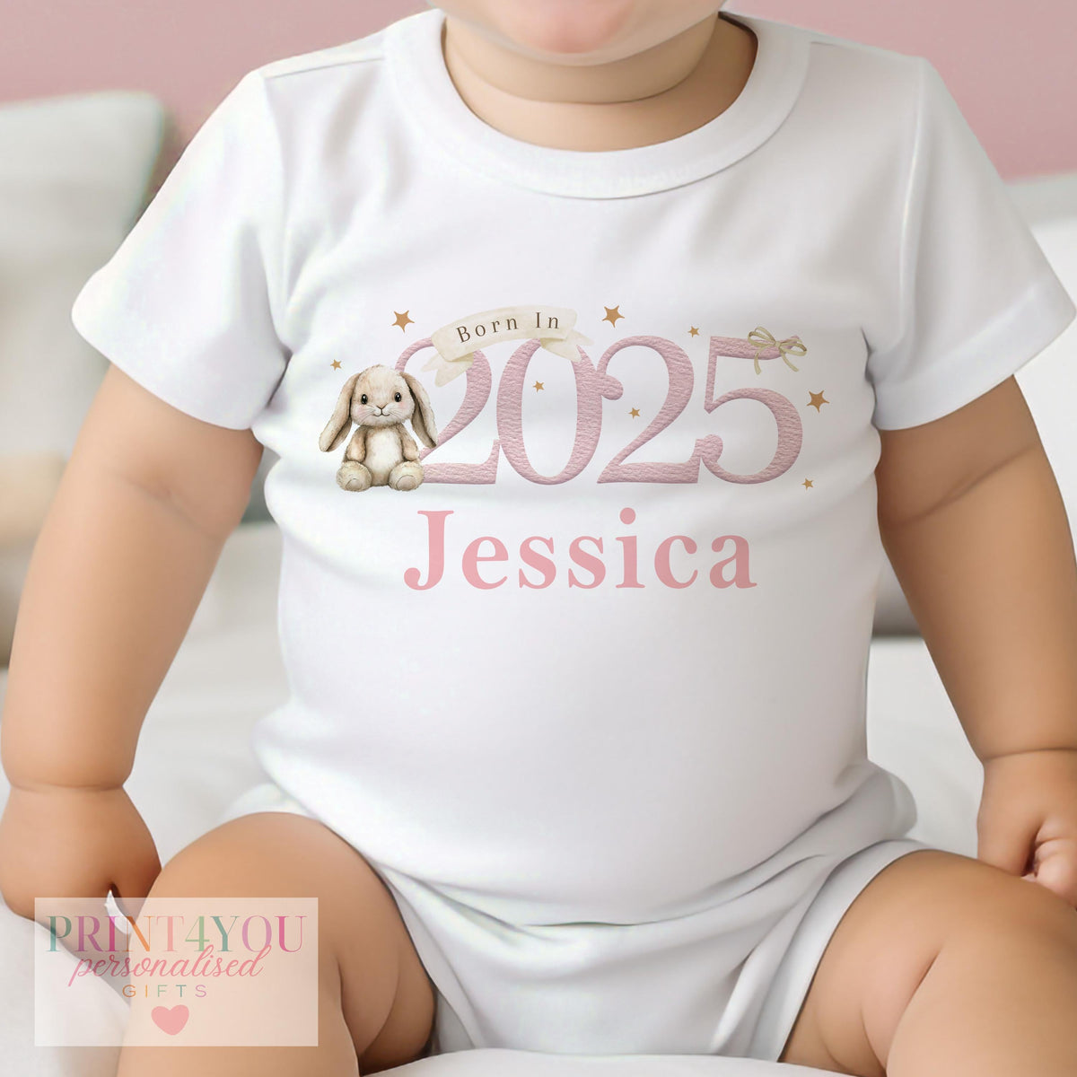 Personalised pink bunny 2025 baby vest with custom name printed on soft cotton.