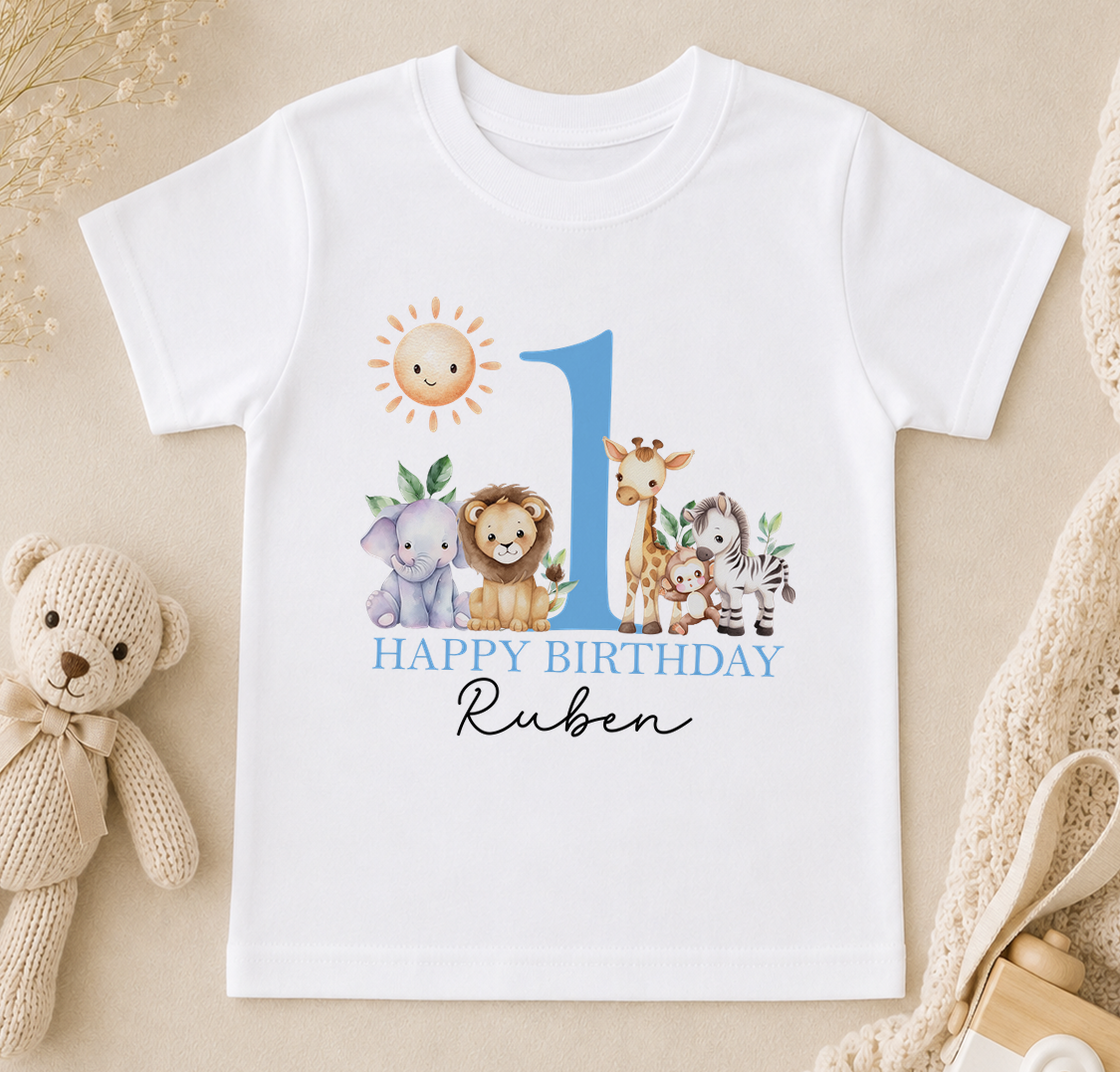 White t-shirt printed with a sun, jungle animals and 'Happy Birthday' with a personalised name.