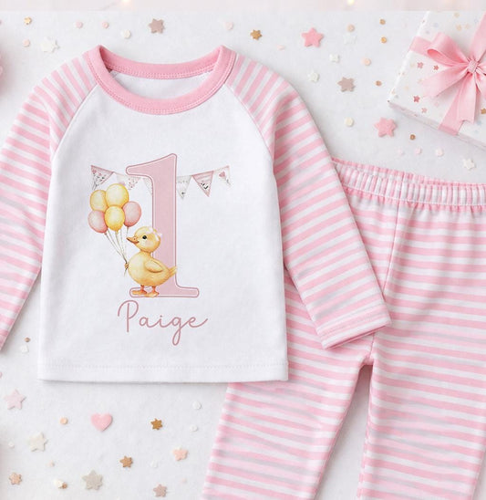 Personalised pink striped duck birthday pyjamas, printed with a custom name