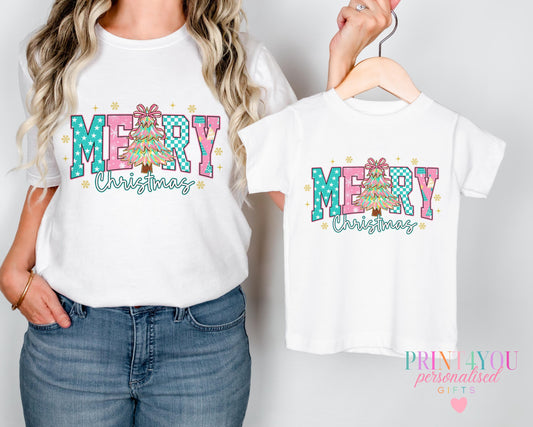 Baby wearing a Christmas Tree design mummy and me t-shirt with 'Merry Christmas' slogan and, 0-3 months