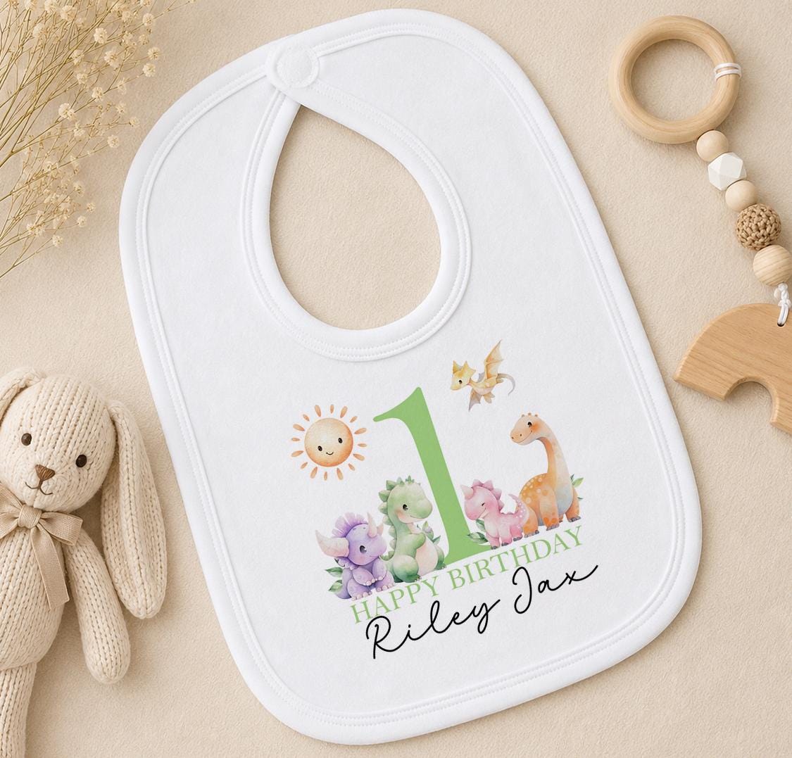 Personalised dinosaur first birthday bib with Happy Birthday Riley Jax