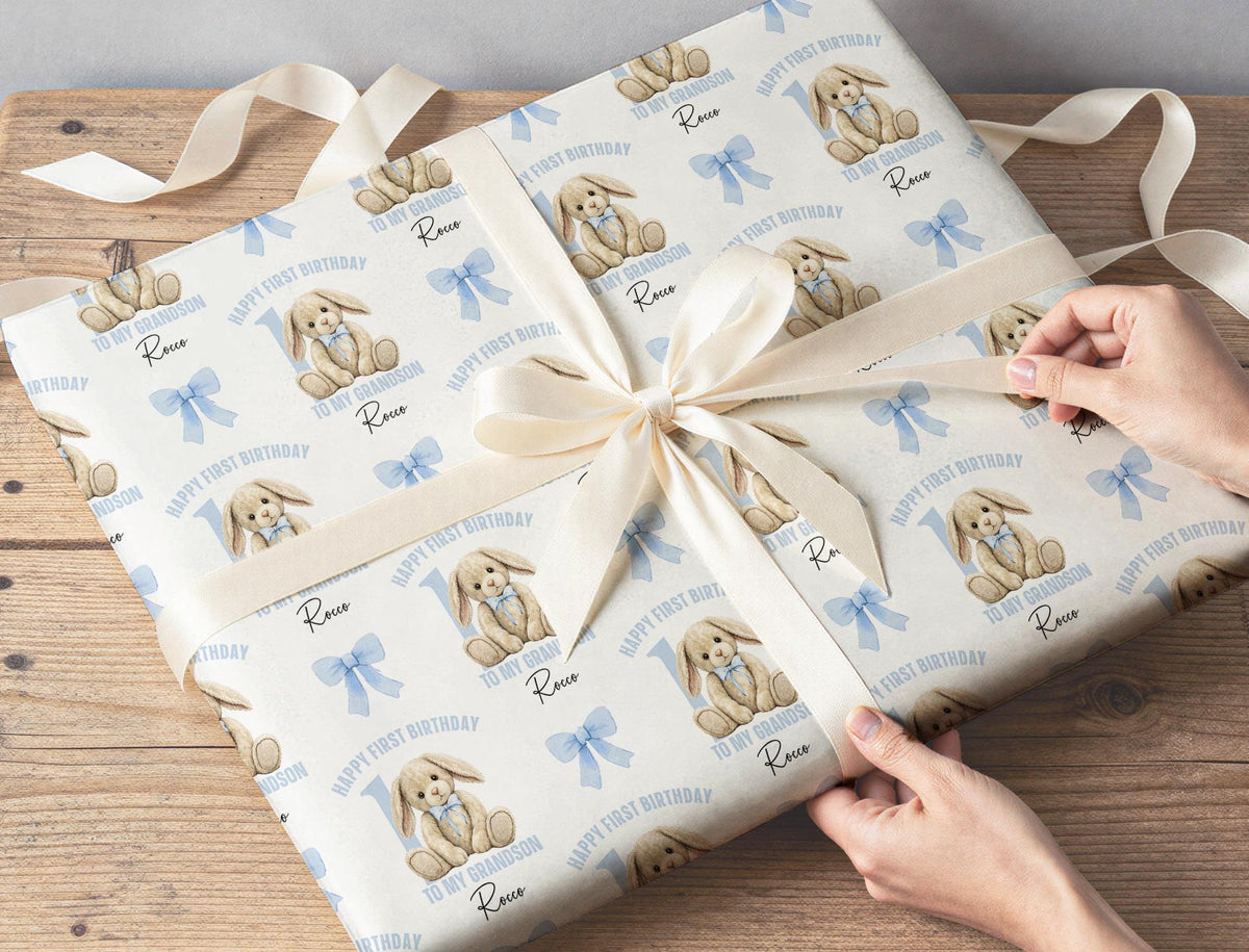 Gift wrapped in the personalised pastel blue bunny wrapping paper, tied with ribbon.