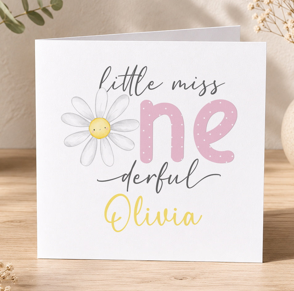 Personalised first birthday card featuring pink polka dots and florals with the text Little Miss One-derful, shown with a personalisation example for Olivia