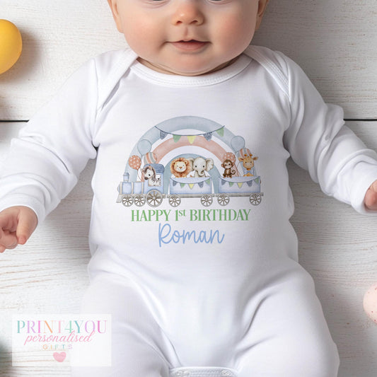 Personalised first birthday outfit printed with a safari train design, safari animals and the child's custom name.