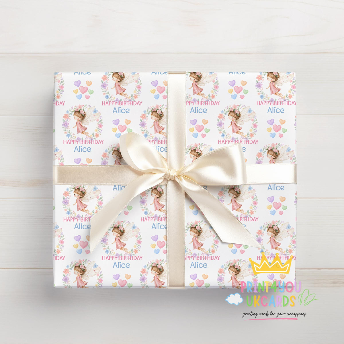 Roll of personalised fairy wrapping paper packaged in a postal tube ready for delivery.