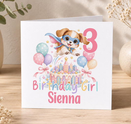 Personalised superhero puppy birthday card – caped puppy flying over a pink cake with a pink 3, Birthday Girl Sienna