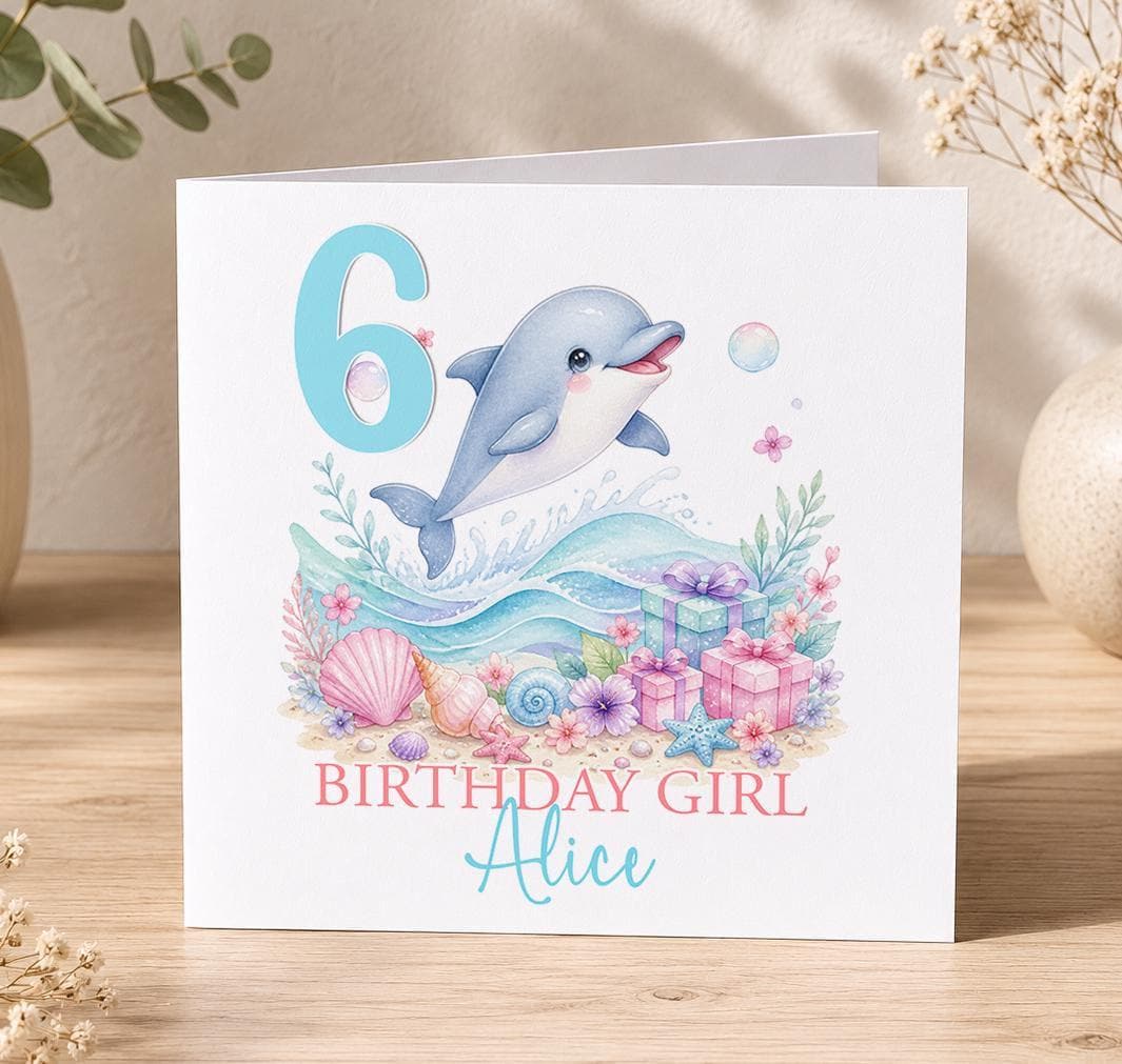 Personalised dolphin birthday card – dolphin leaping over coral and shells with a blue 6, Birthday Girl Alice