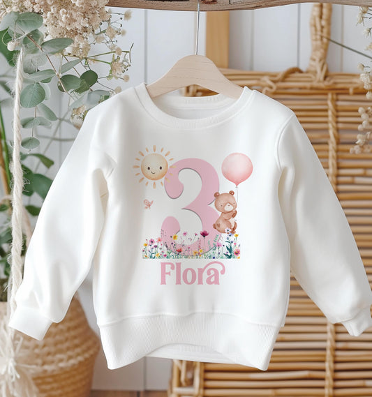 Personalised white cotton sweatshirt with teddy bear design, custom name and birthday age, baby size 6-12 months