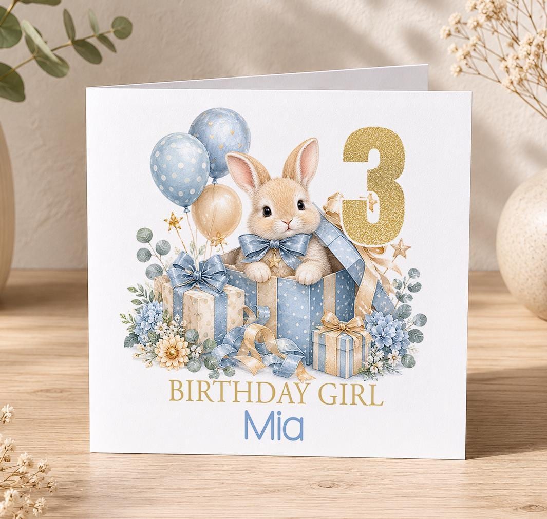 Personalised bunny birthday card – bunny in a blue present with balloons and a gold 3, Birthday Girl Mia