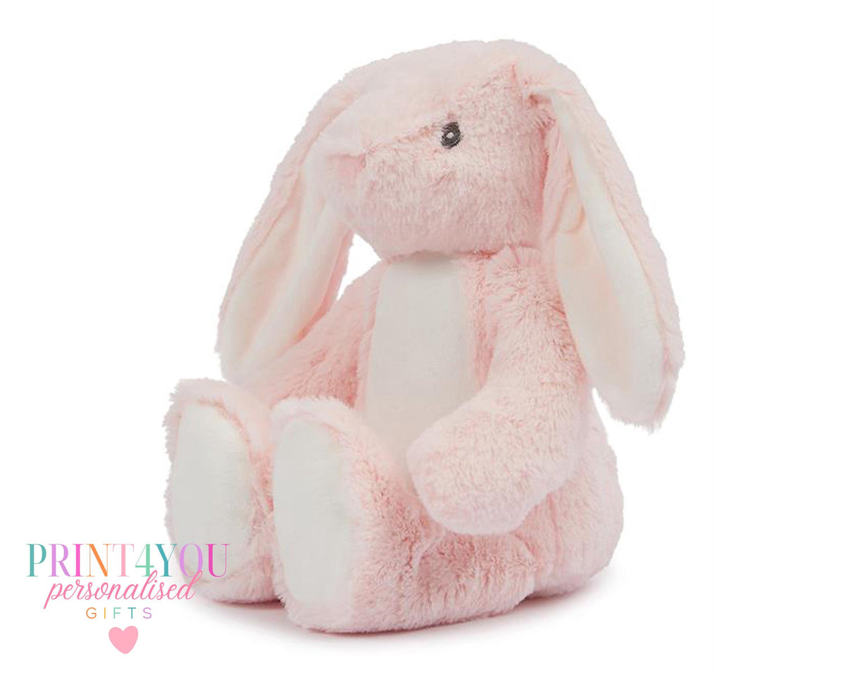 Personalised bunny book cushion with velvet bunny toy, close-up view