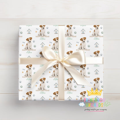 Roll of personalised Jack Russell wrapping paper packaged in a postal tube ready for delivery.