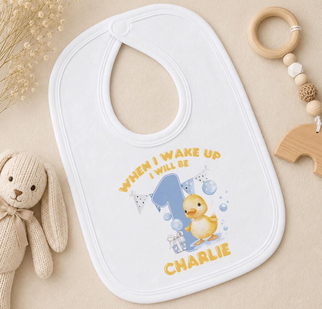 Personalised When I Wake Up I Will Be 1 bib with a duckling and the name Charlie