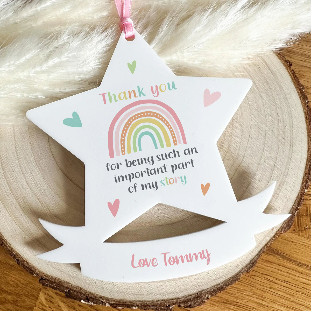Lifestyle photo of the acrylic thank you star plaque displayed as a gift keepsake