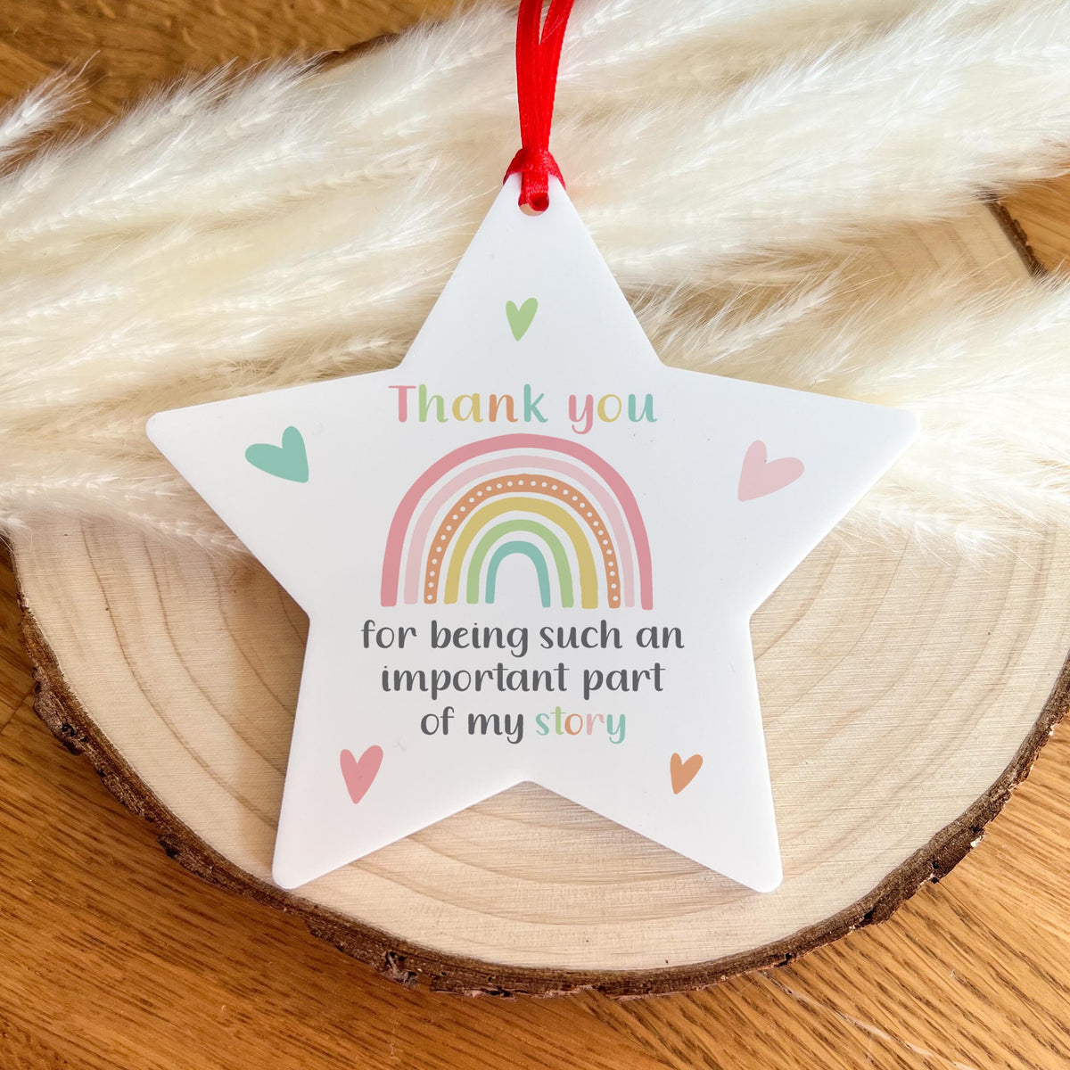 White acrylic hanging star decoration with rainbow heart design and thank you teacher message