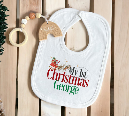 Personalised Santa sleigh baby bib for baby's first Christmas, printed with a custom name