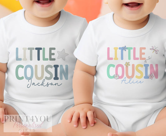 Personalised Little Cousin bib in soft white cotton, printed with baby's name