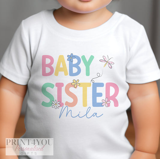 Personalised Baby Sister bib in soft white cotton, printed with her name