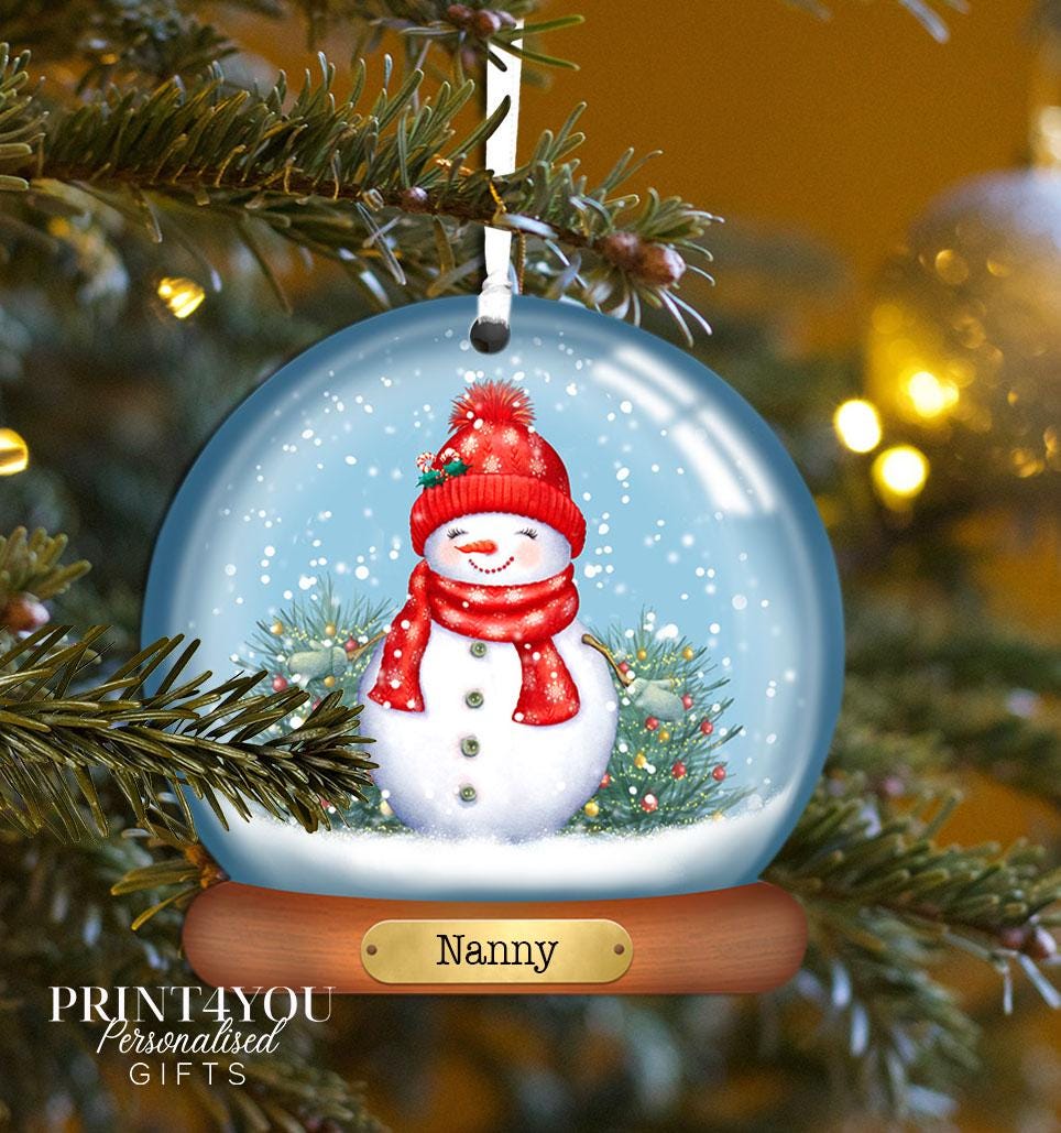 Personalised acrylic Christmas bauble featuring Snowlady design with custom name