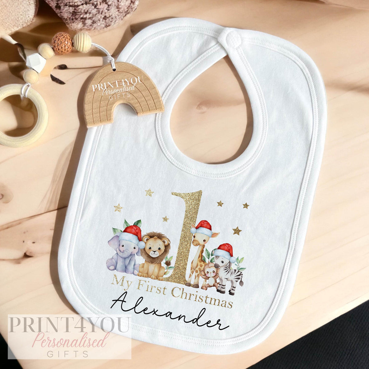 Close-up of the gold-effect safari jungle design personalised with baby's name.