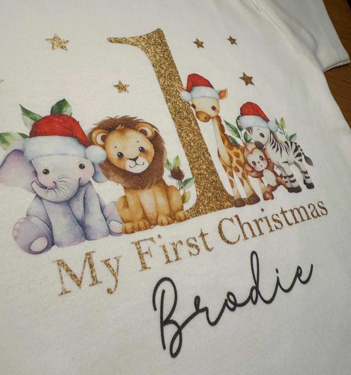 Personalised first Christmas gold-effect safari jungle vest, printed with baby's name.